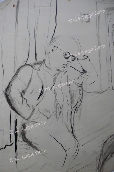 Sitzender Mann mit Brille