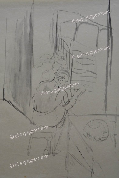 Mann vor Fenster sitzend