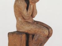 Sitzender Knabe