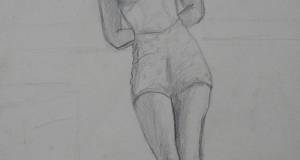 Weibliche Figur in Bikini posierend