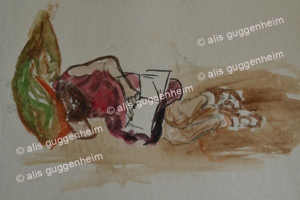 Mädchen lesend liegend